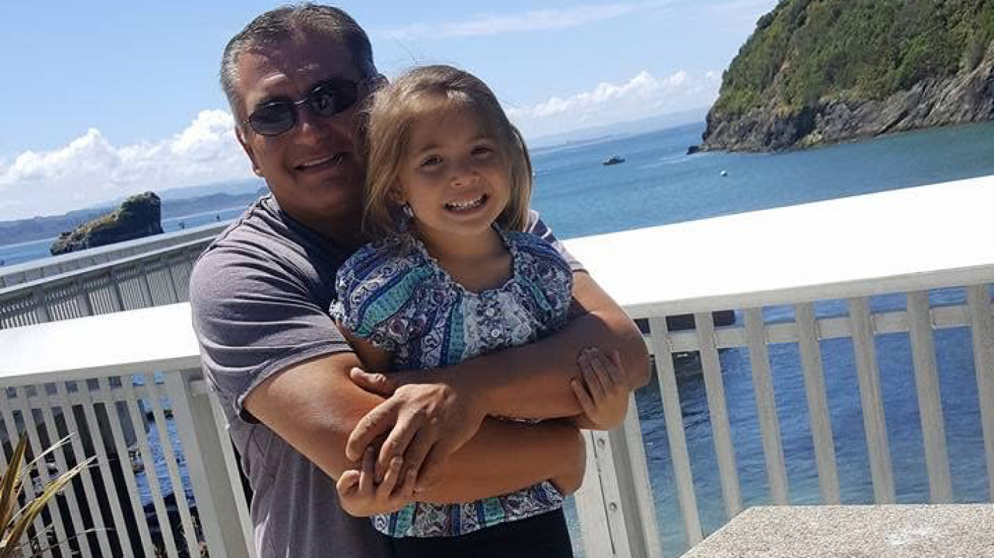 Help a young daughter lay her father to rest